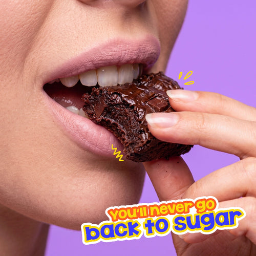 A close-up lifestyle shot of a person biting into a chocolate brownie, with a purple background and the text 'you'll never go back to sugar' in the lower right corner.